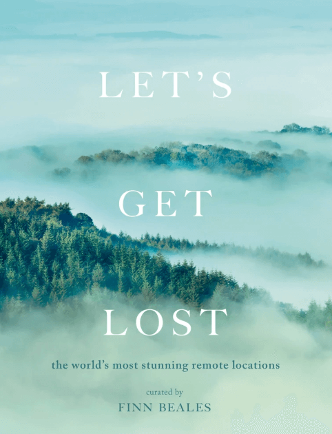 misty mountains and forest on the cover of Let's Get Lost
