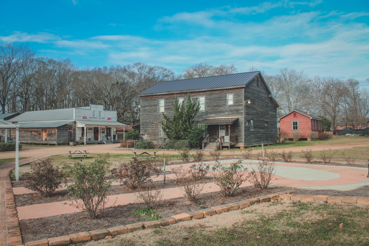 Outside of the Mississippi Forestry & Agriculture Museum are old buildings plucked from a different time
