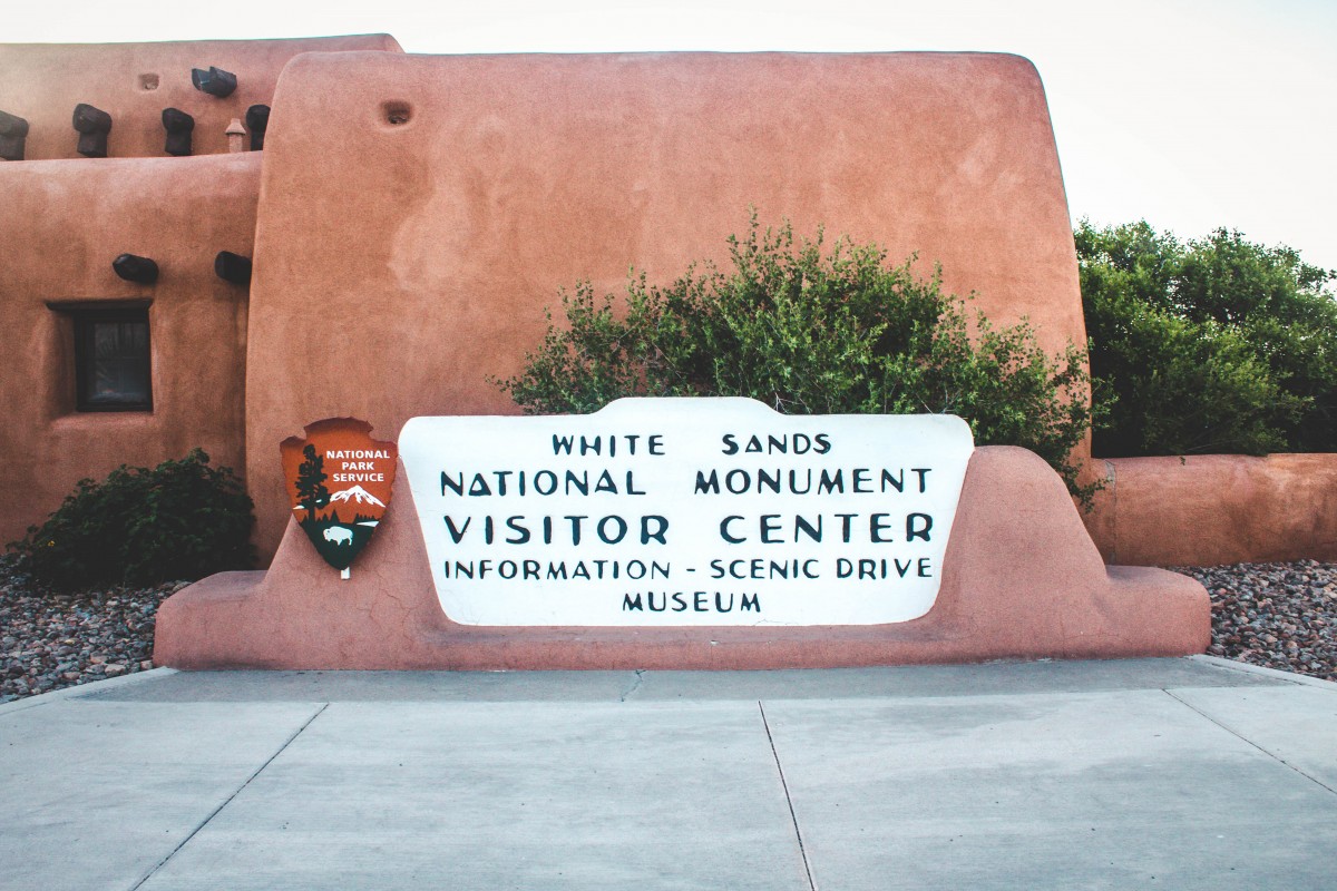 entrance reading White Sands National Monument (sign from when White Sands was a National Monument and not a National Park)