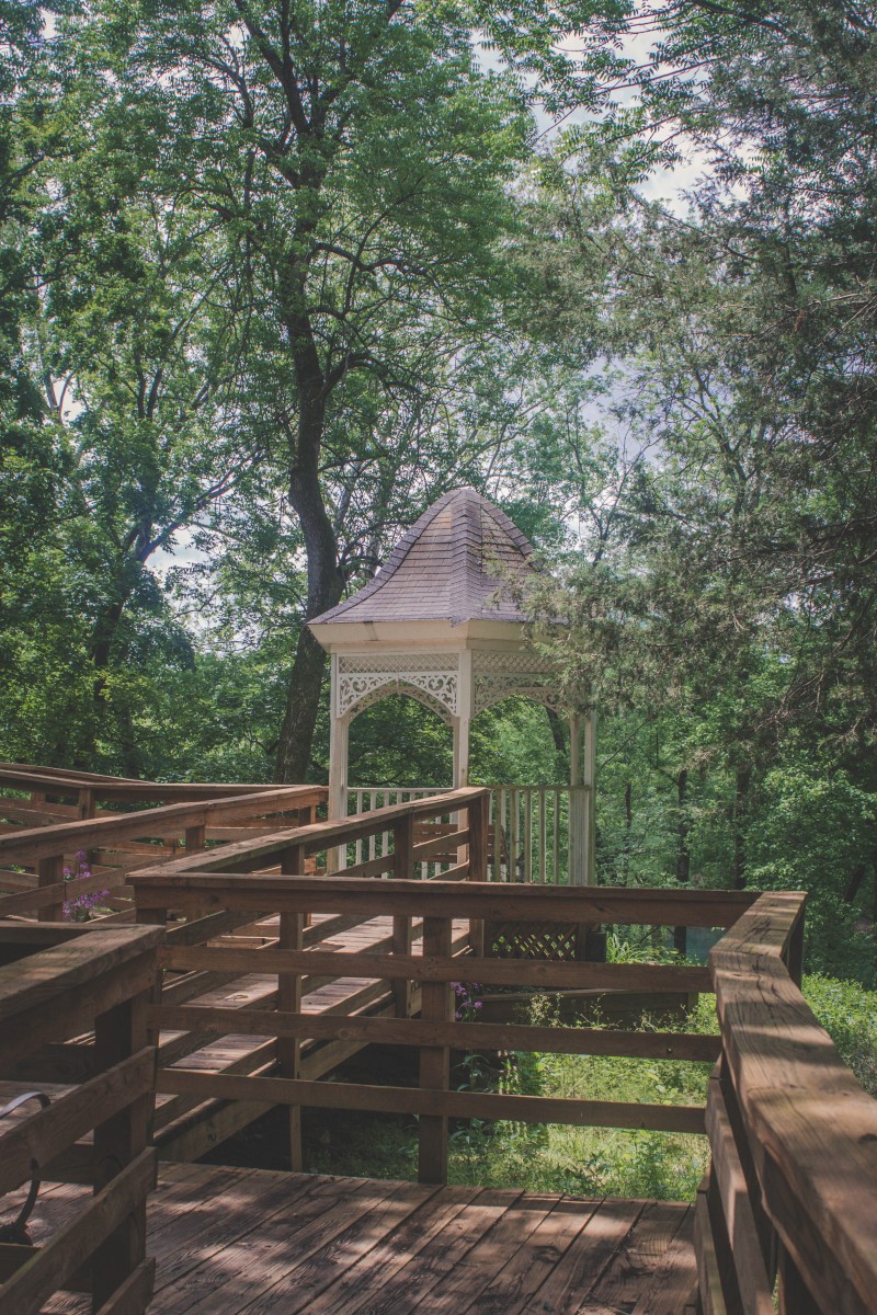 Blue Spring Arkansas wheelchair accessible wooden ramp and a fairytale gazebo just off the ramp. 