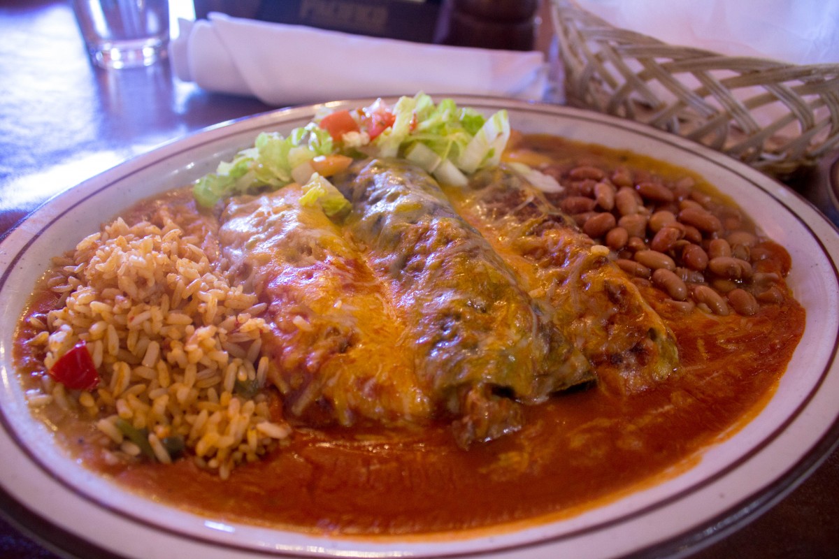 This was a sampler plate that I got in New Mexico. It's got one set of stacked enchiladas, lots of sauce, salad, beans, rice, and there's something in the middle that (like the good blogger I am), I completely forget what it is. 