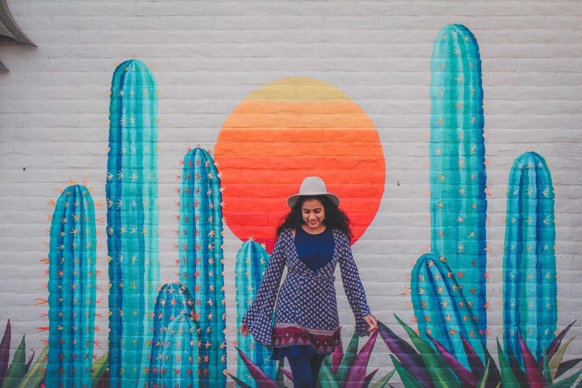 Standing in front of the It's That Hot in Scottsdale Instagrammable Wall