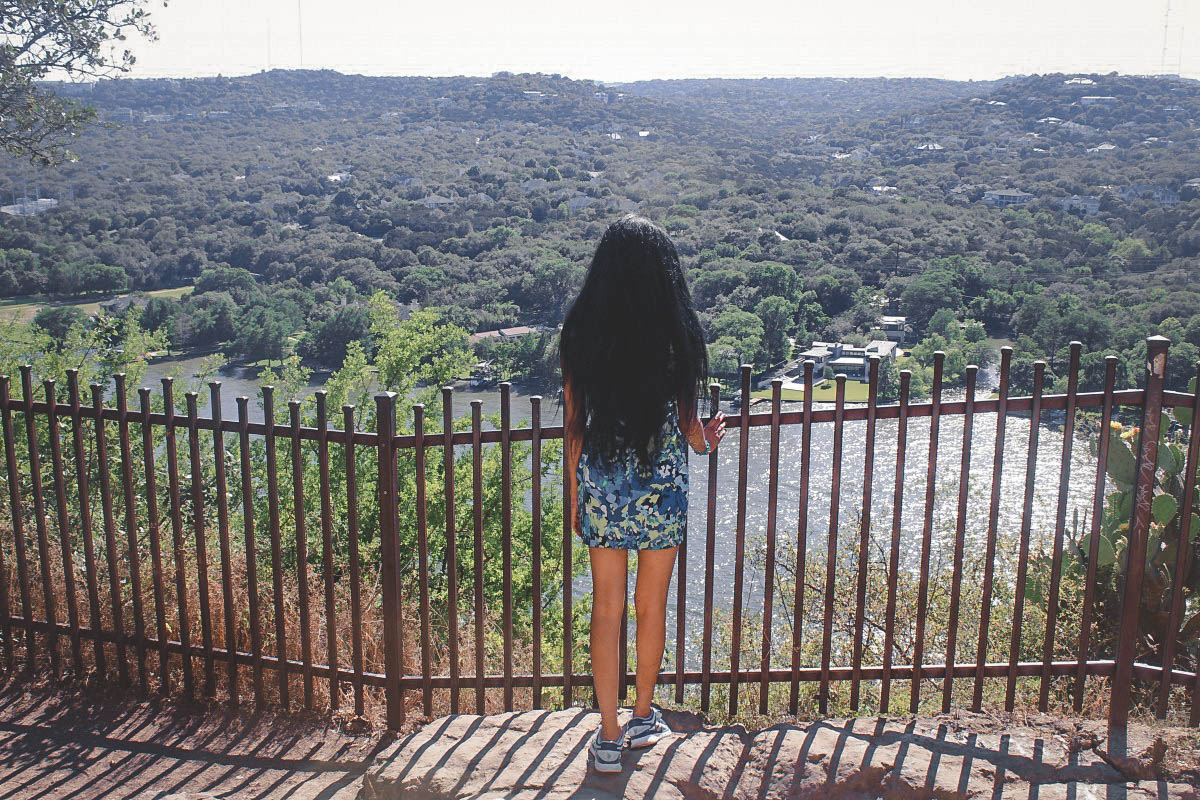 girl looking over Mount Bonnell during her one day in Austin