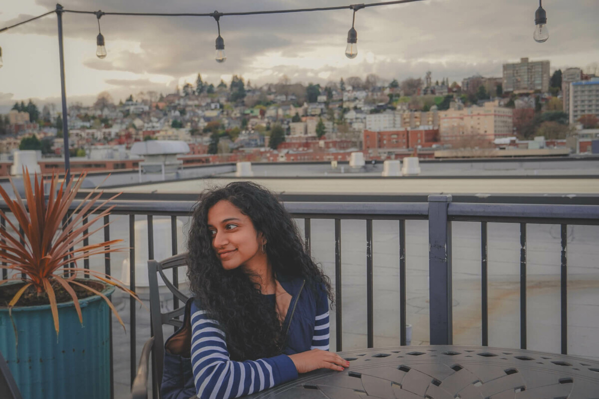 Here’s How To Care For Curly Hair While Traveling, According To A Hairstylist
