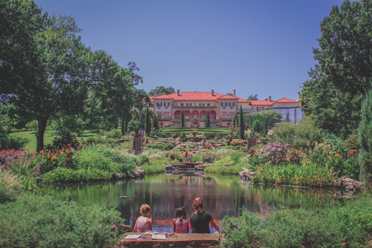 photo of the gardens at the Philbrook Museum, lake and terraced gardens facing the house