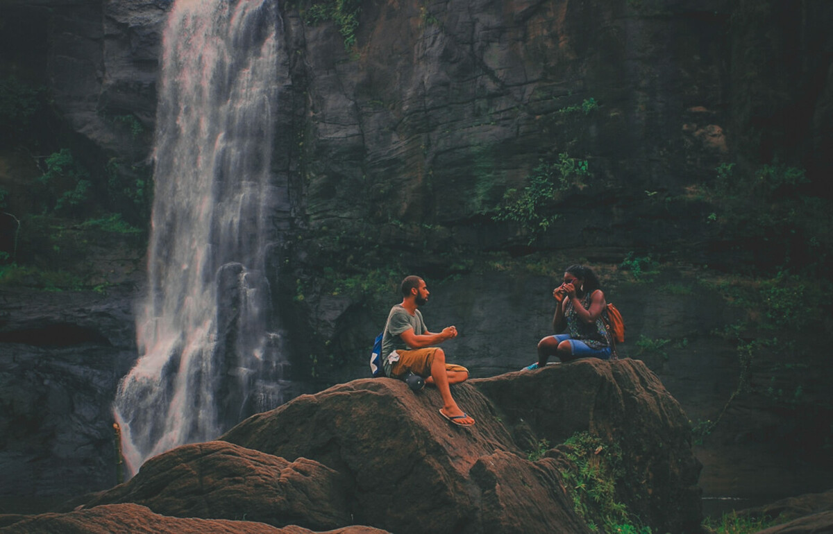 couple talking to represent deep questions to ask on a road trip