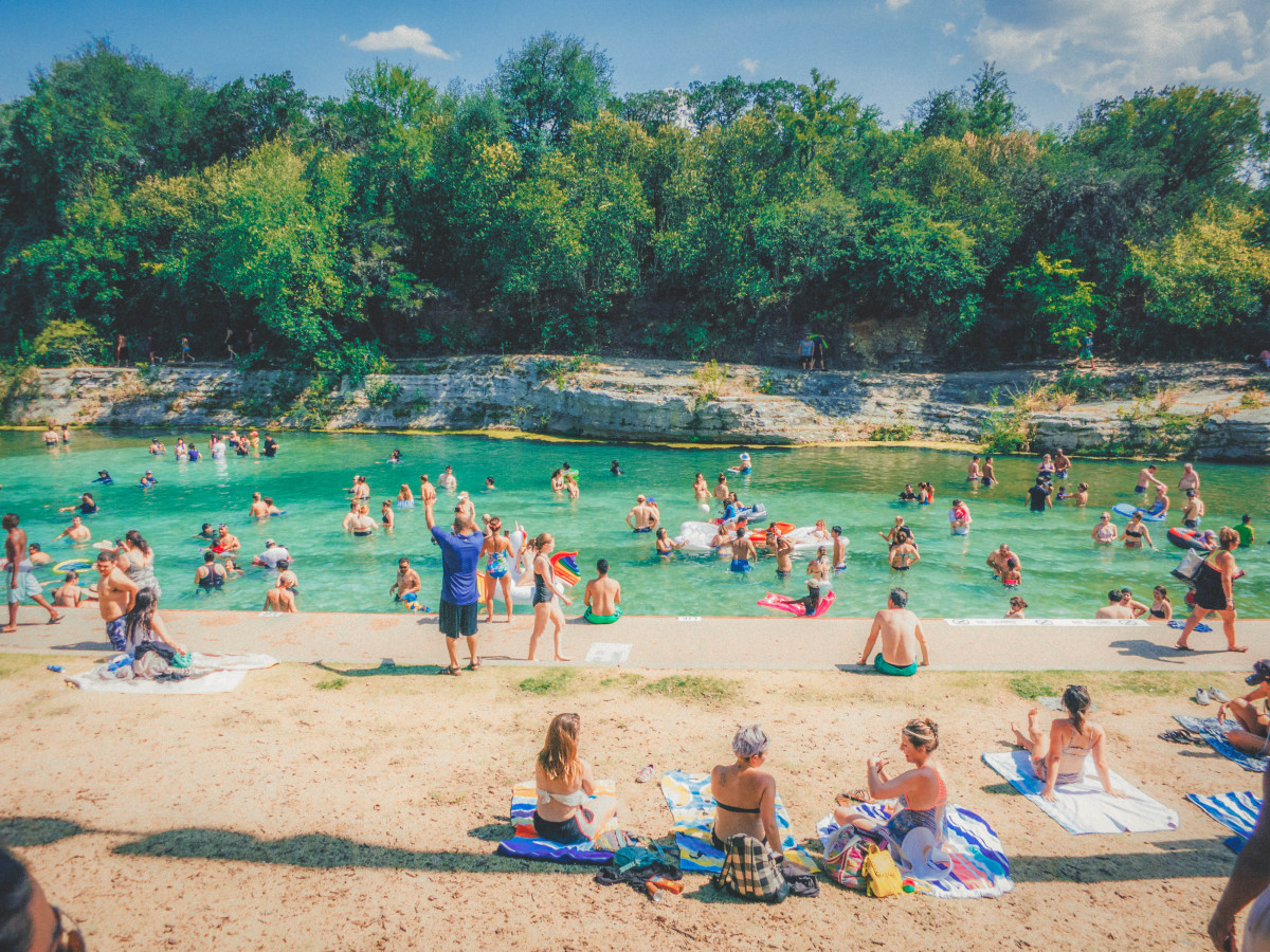Best things to do in Austin: people swimming in Barton Springs Pool