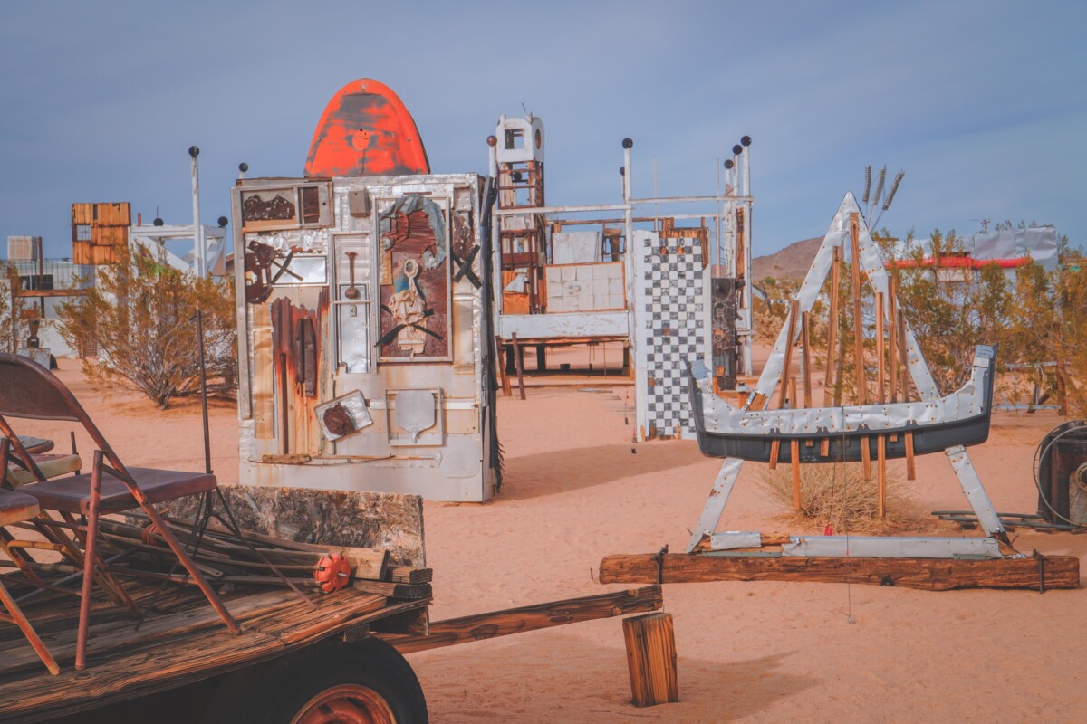 one of the best things to do in Joshua Tree the town is to venture out to Noah Purifoy Outdoor Desert Art Museum