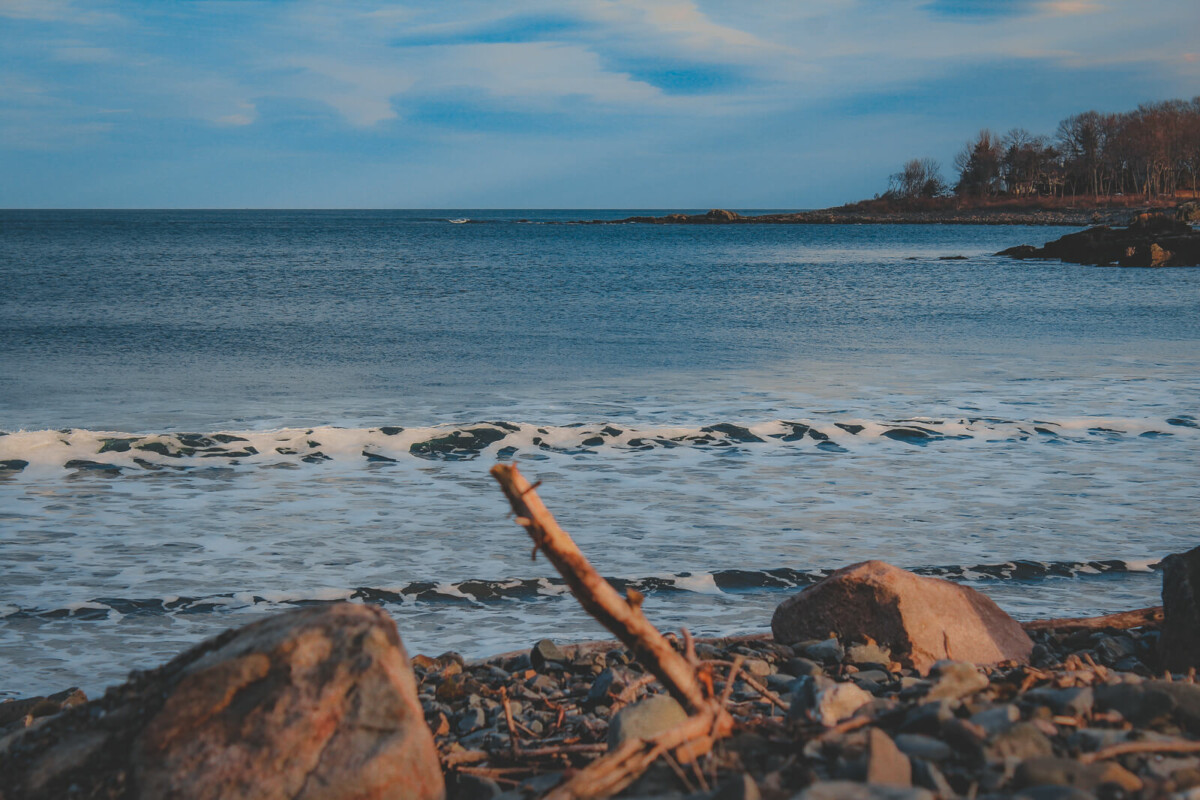 one of the most beautiful beaches in York Maine, this is a photo of the waters of York Harbor Beach and its rocky shoreline