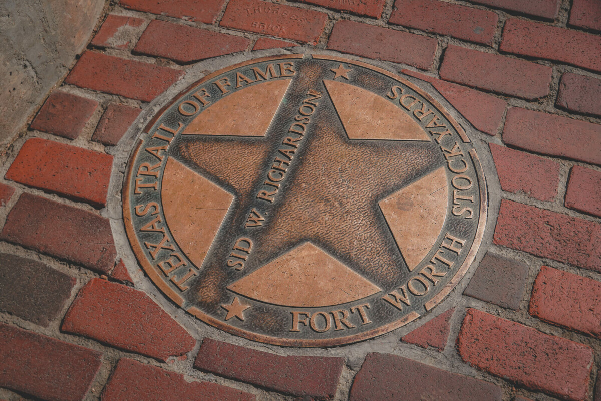 what not to miss at The Fort Worth Stockyards: Texas stars as you're walking are easy to miss, but if you look down you might spot recognizable names