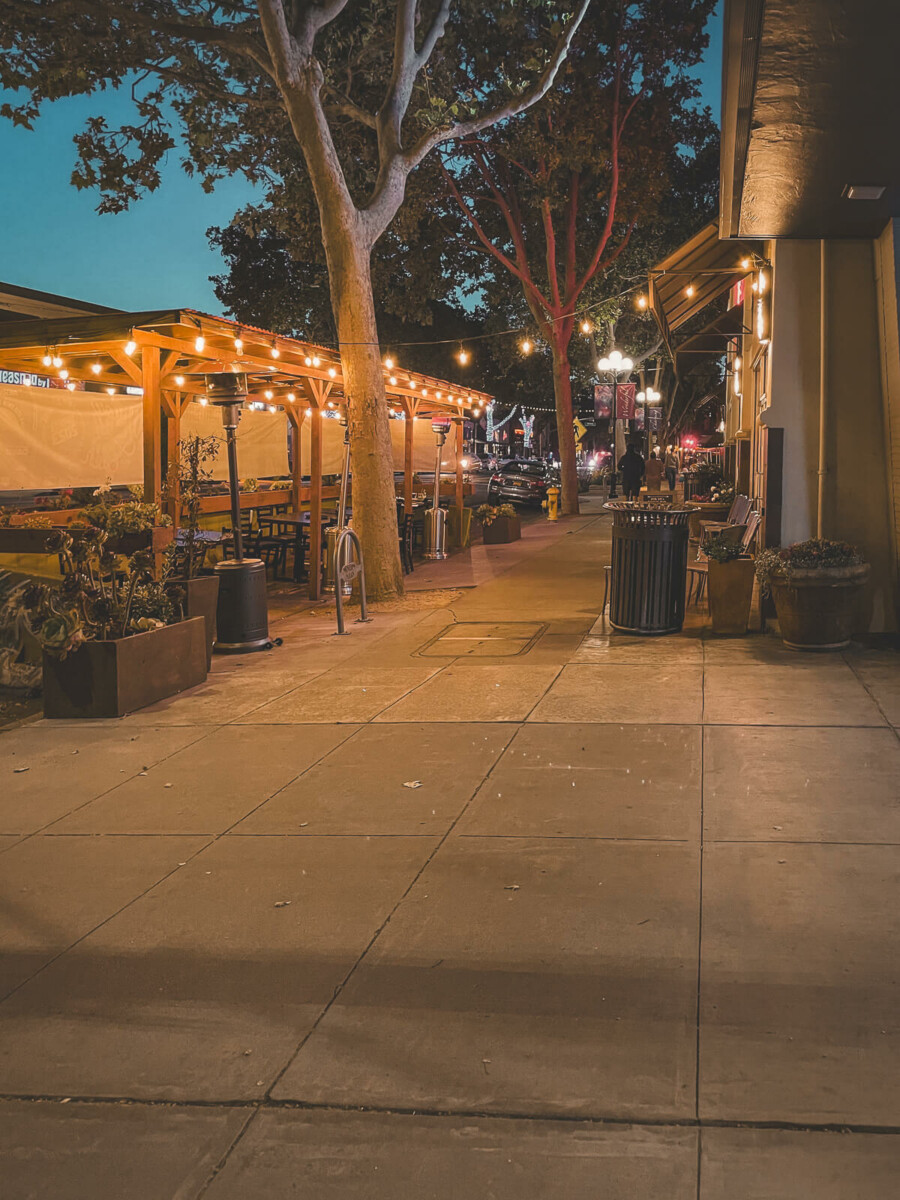 Lincoln Ave Willow Glen at night (sidewalk illuminated with strings of lights)