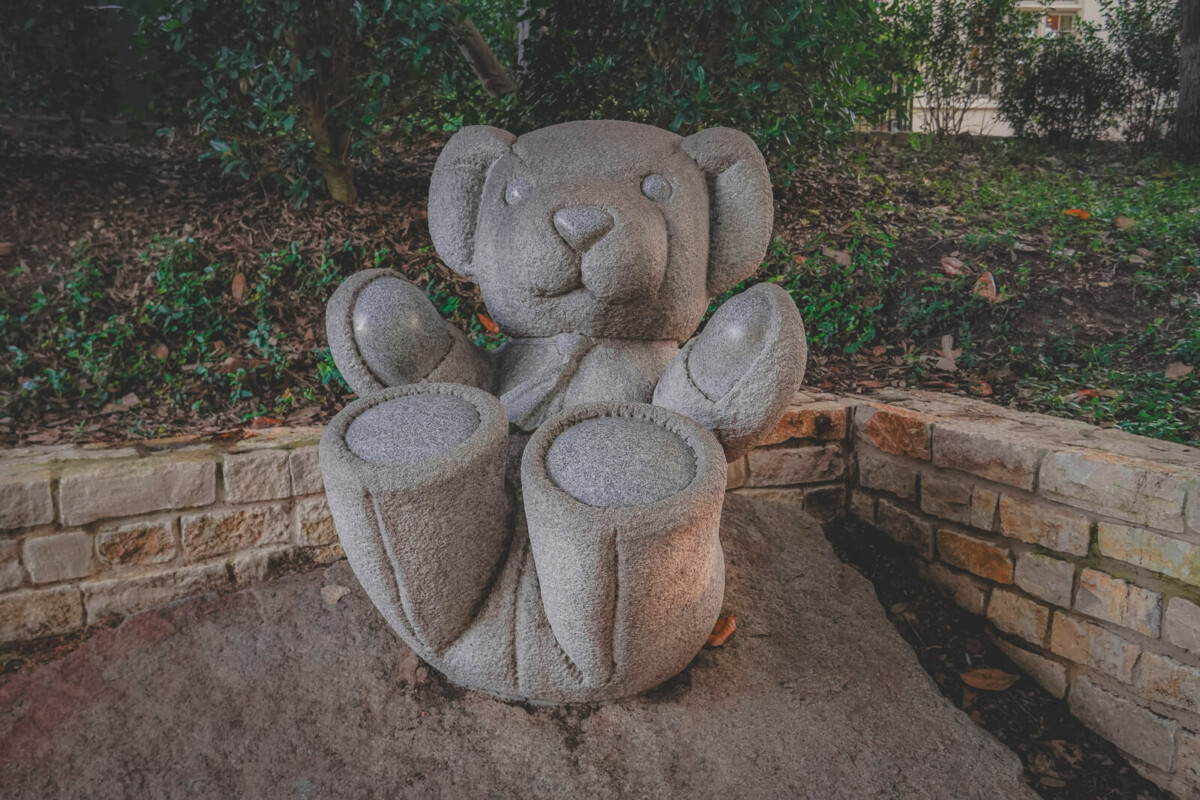 one of the four foot tall teddy bear statues in Lakeside Park