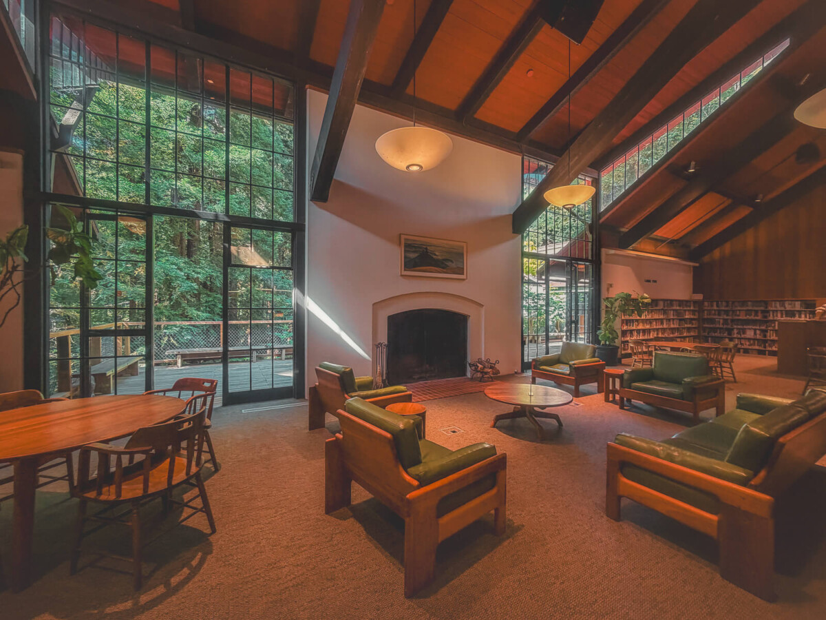 Mill Valley Library fireplace, floor-to-ceiling windows, and cozy seating. 