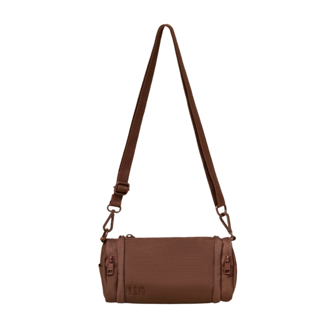 a charm that expands into a purse, one of our favorite mini travel accessories